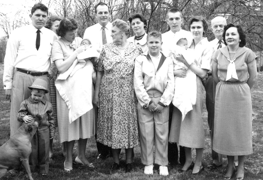 Black and white multi-generational family photo taken in 1957.